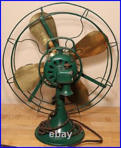Antique GE 16 Brass bladed green oscillating fan missing switch coil sold as is