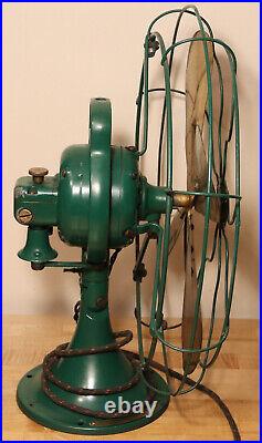 Antique GE 16 Brass bladed green oscillating fan missing switch coil sold as is